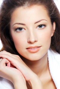 Portrait of cute young woman face